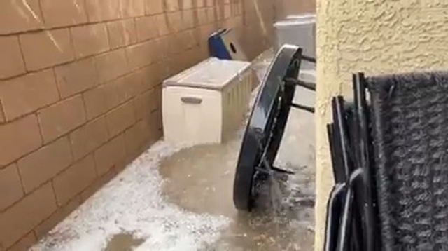 Las Vegas Review Journal Sports | Thunderstorm brings heavy rain to southeast Henderson