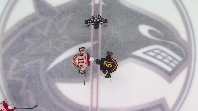 Hughes Powers Canucks Past Flames in Tense Pacific Division Battle